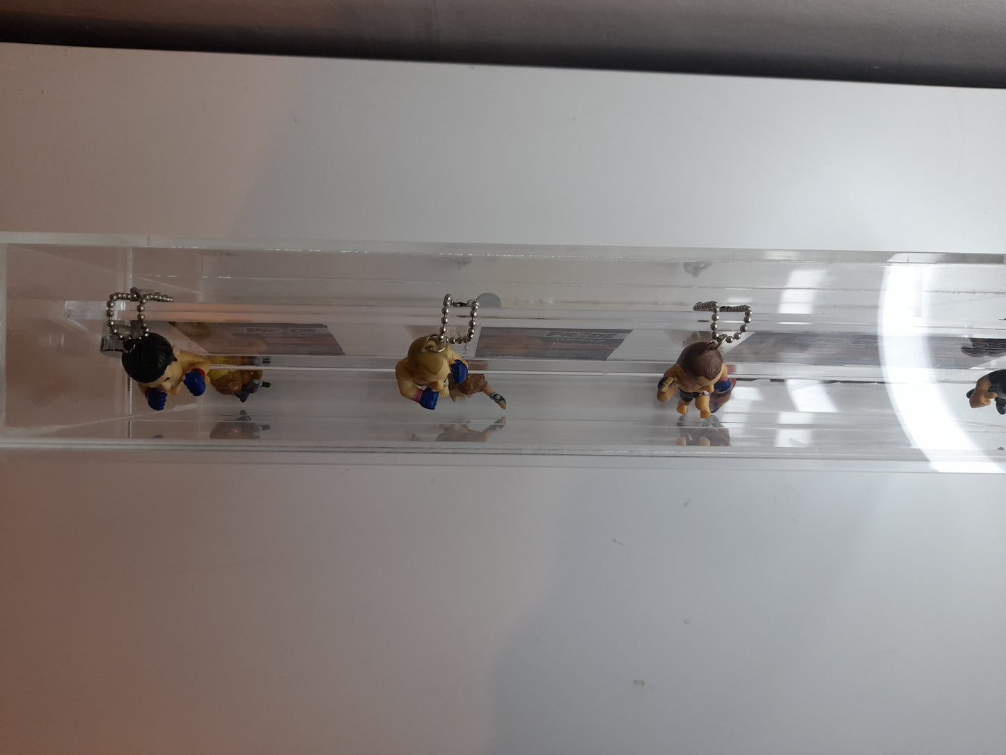 Pride Fighting Championship 7-11 Mini Figure Keychain Set in Display Case with Logo