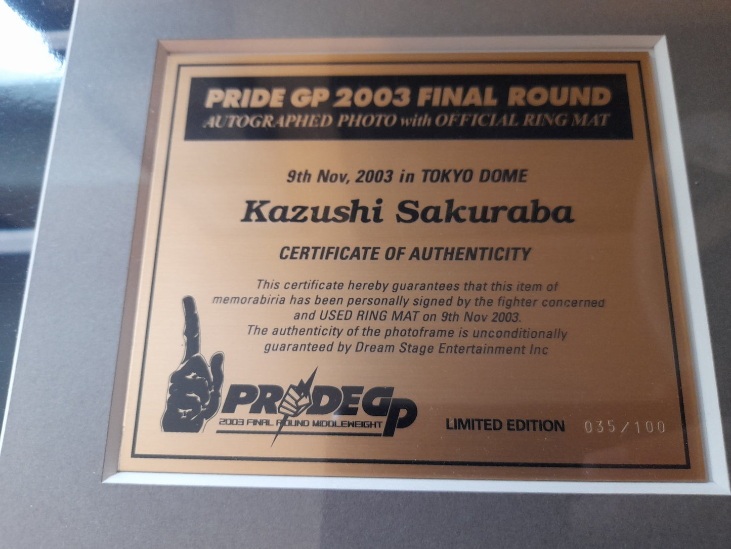Pride FC 2003 GP Framed Ring Mat Piece & PhotoPride FC 2003 GP Framed Limited Edition /100 Used Ring Mat Piece & Signed Photo Plaque - Kazushi Sakuraba