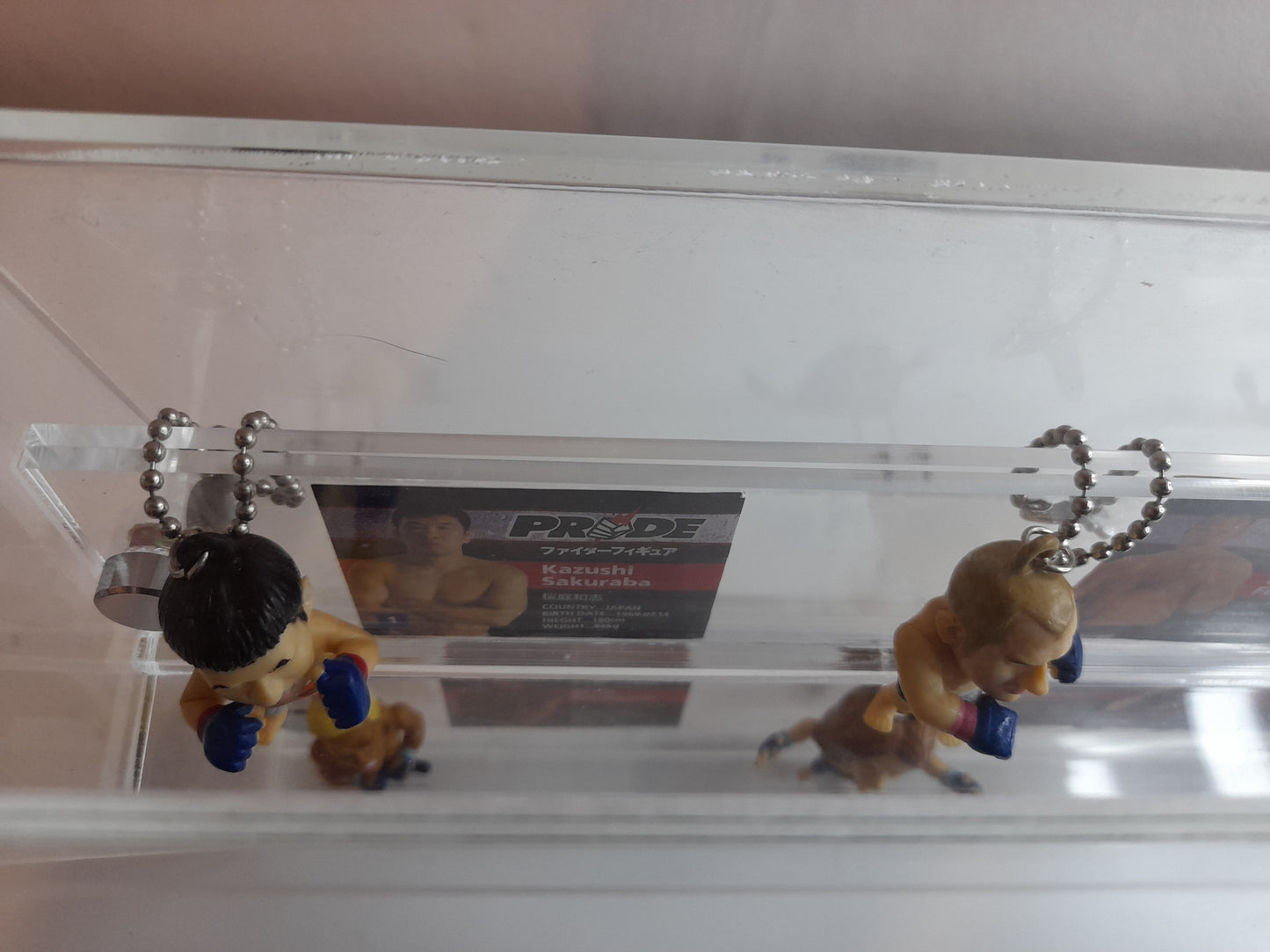 Pride Fighting Championship 7-11 Mini Figure Keychain Set in Display Case with Logo